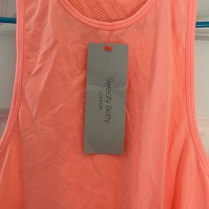 Nwt sweaty betty extreme racer back tank - size small. Color- passion coral